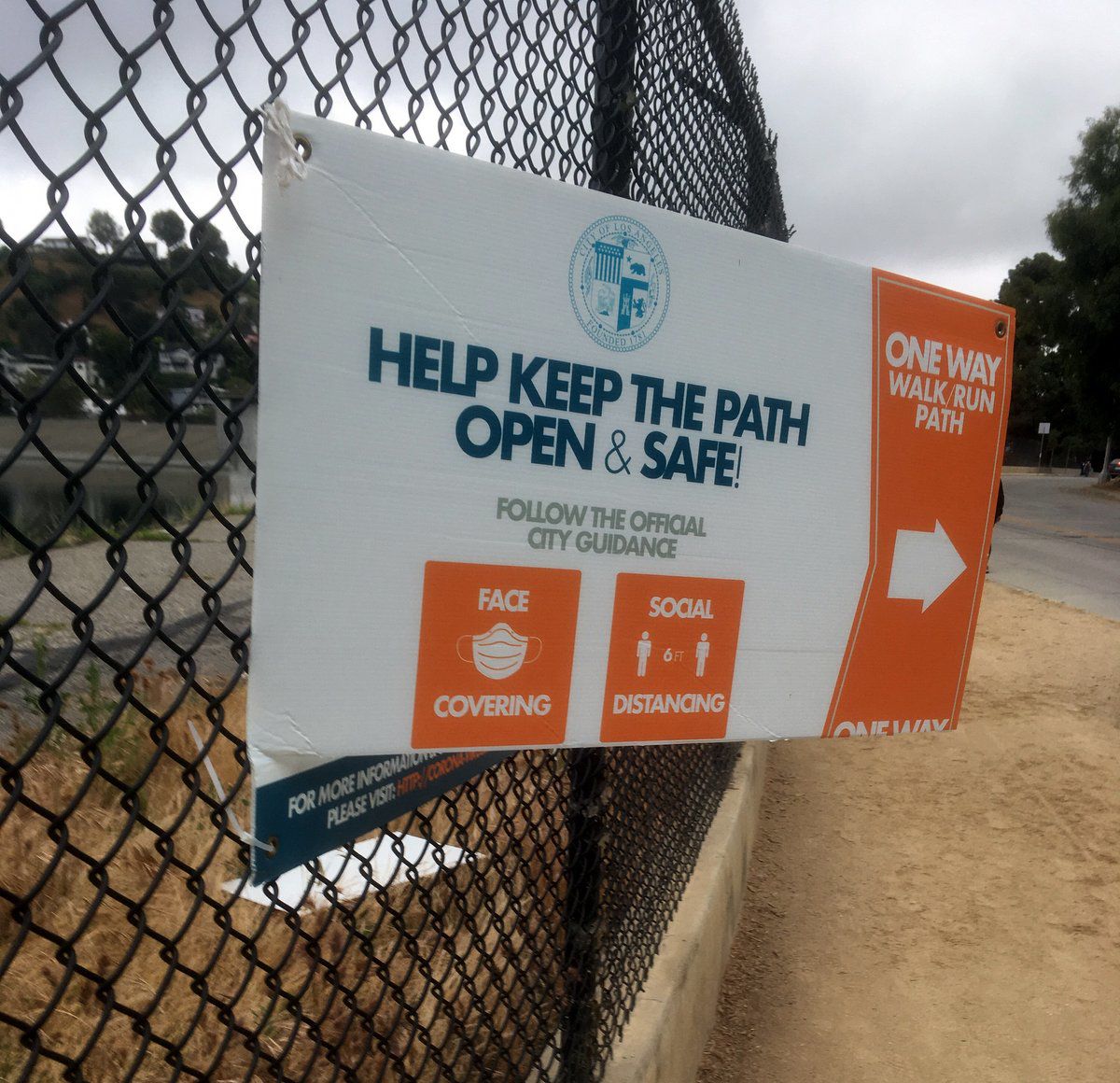 vandalized silver lake reservoir one way sign eastsider reader.jpg